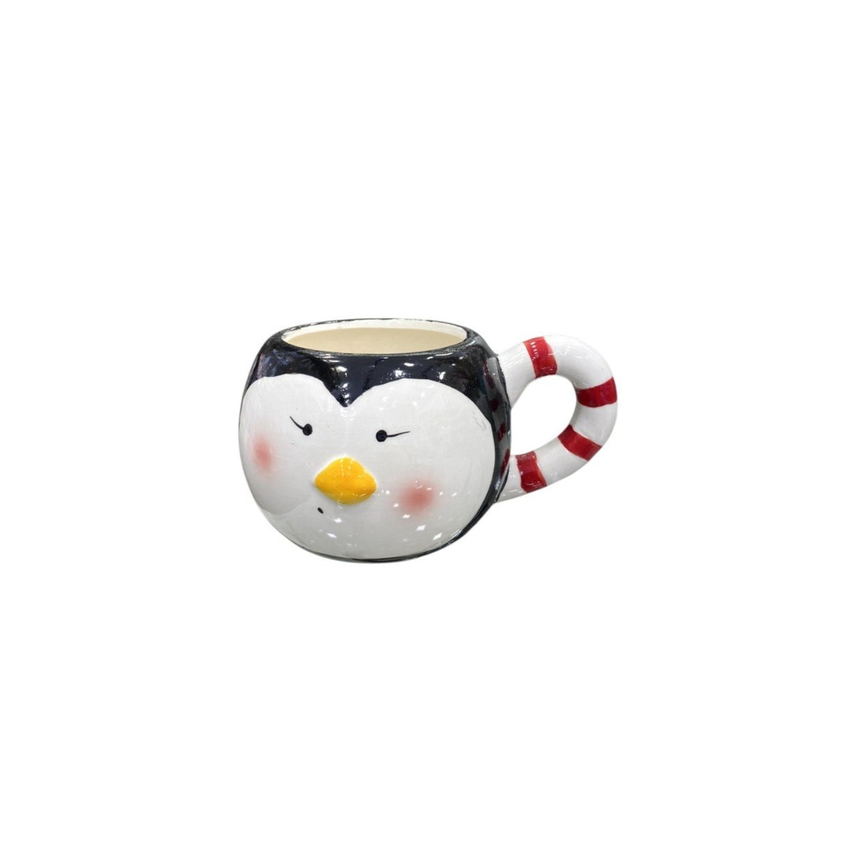 rounded ceramic  mug shaped like a penguin's face