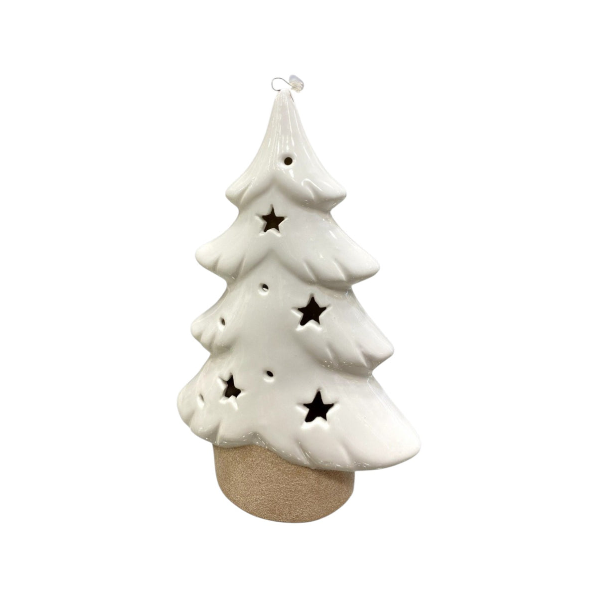 White Christmas tree with a brown base and lights.