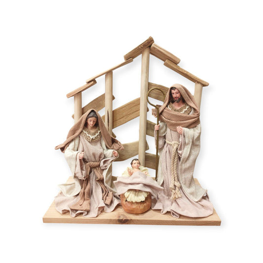 The Holy Family inside the wooden manger