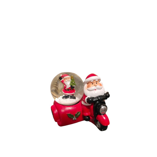 Small snow ball of Santa on a motorcycle