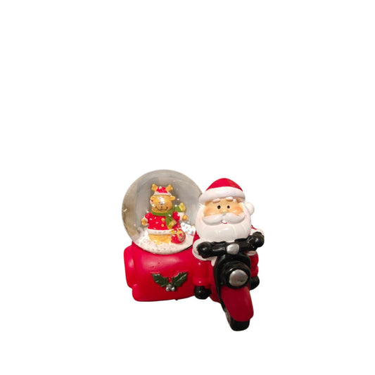 Small snow ball of Santa on a motorcycle
