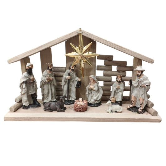 Cave statues inside a wooden manger