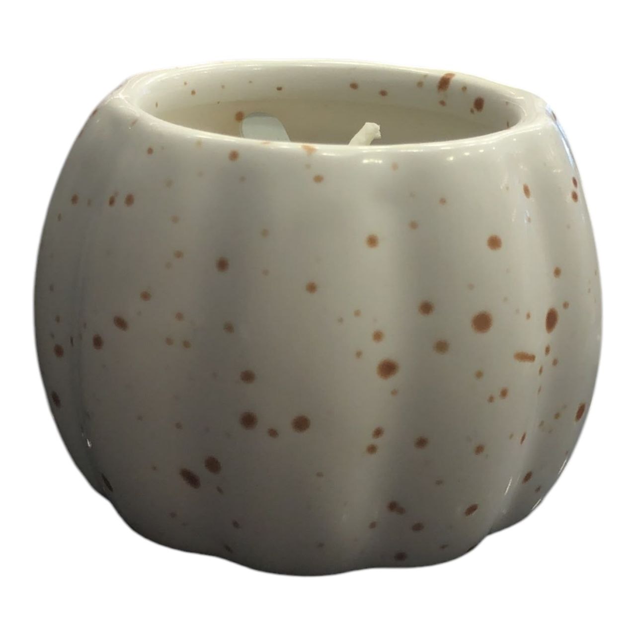 Pumpkin-shaped candle