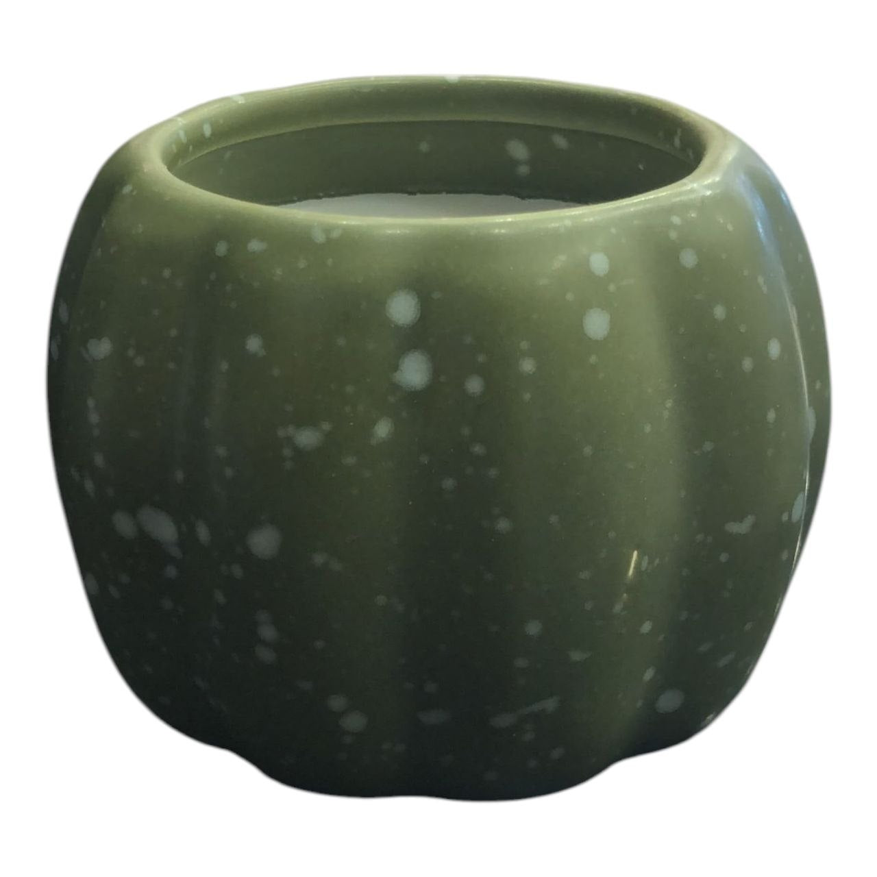Pumpkin-shaped candle