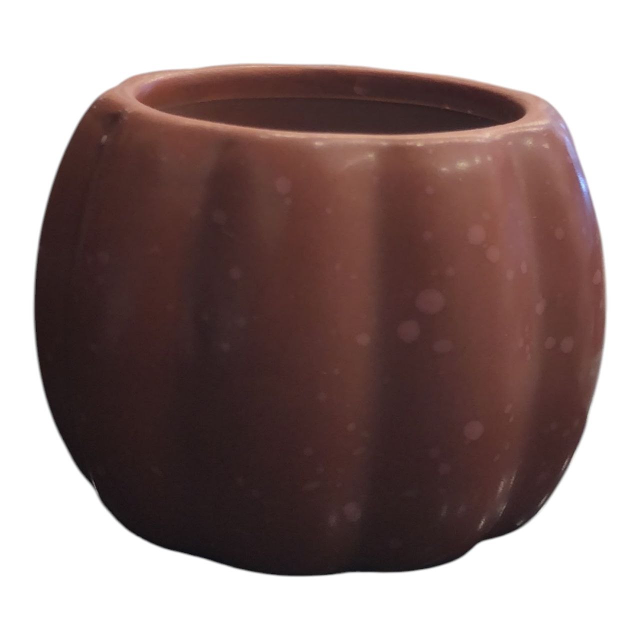 Pumpkin-shaped candle
