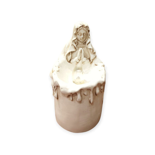 Virgin Mary candle lit
